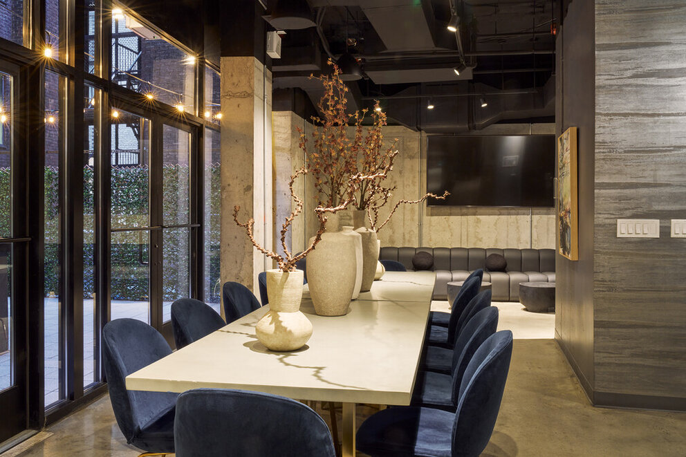 a room with a table and chairs