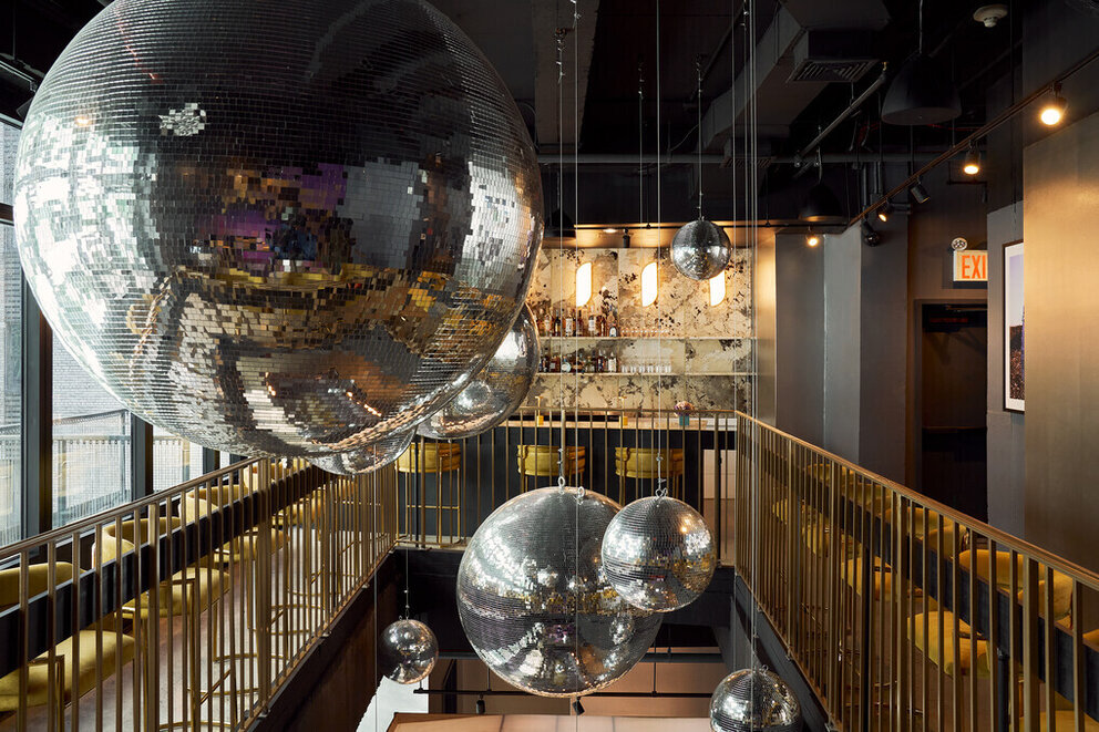 a mirror balls from the ceiling