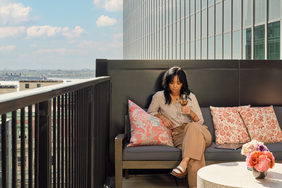 a woman sitting on a couch