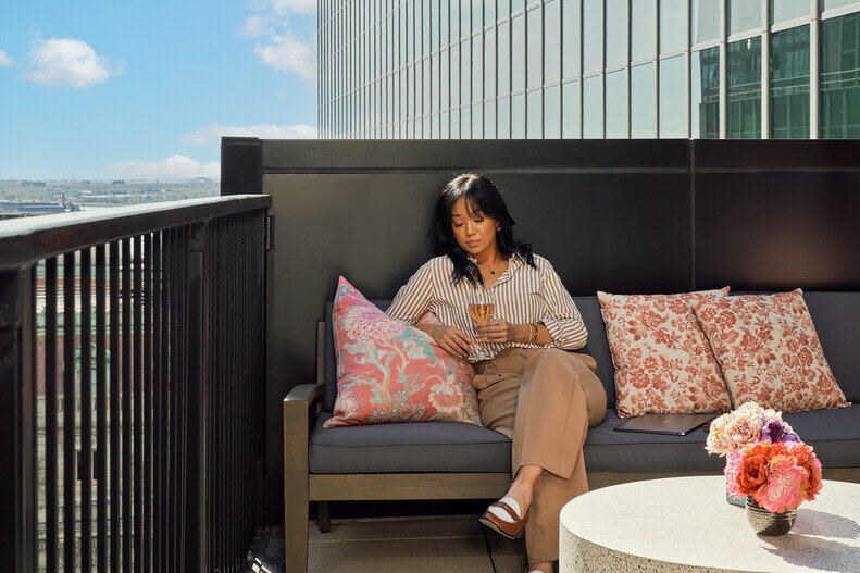 a woman sitting on a couch
