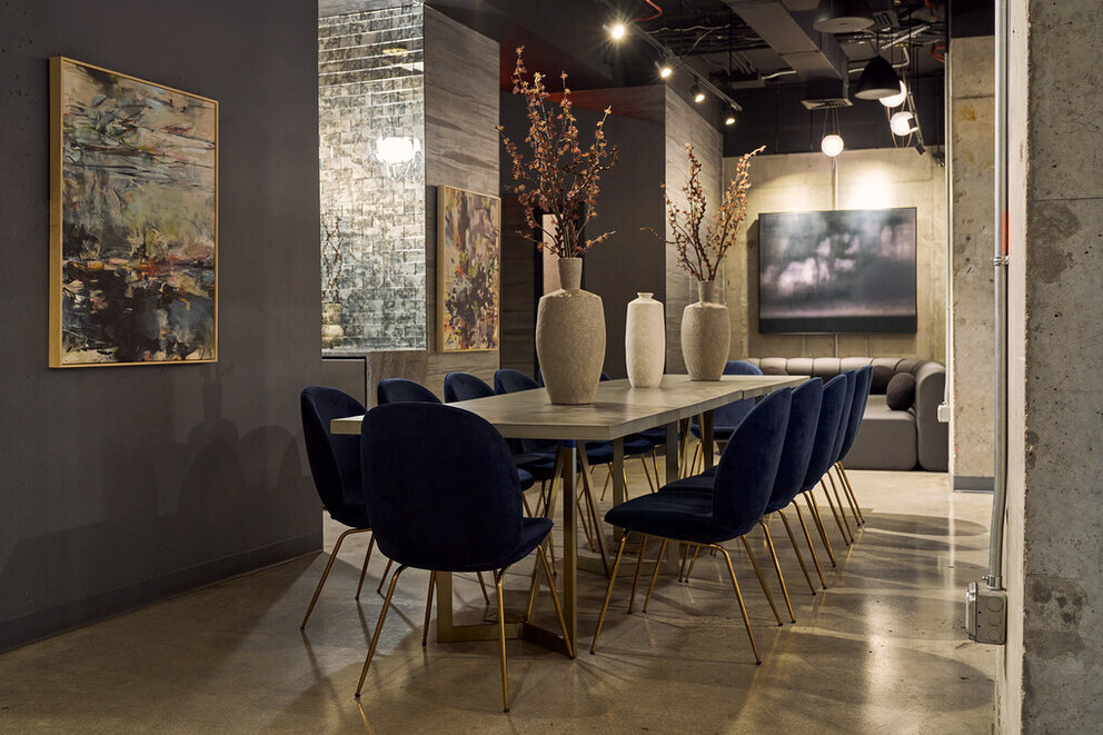 a room with a table and chairs