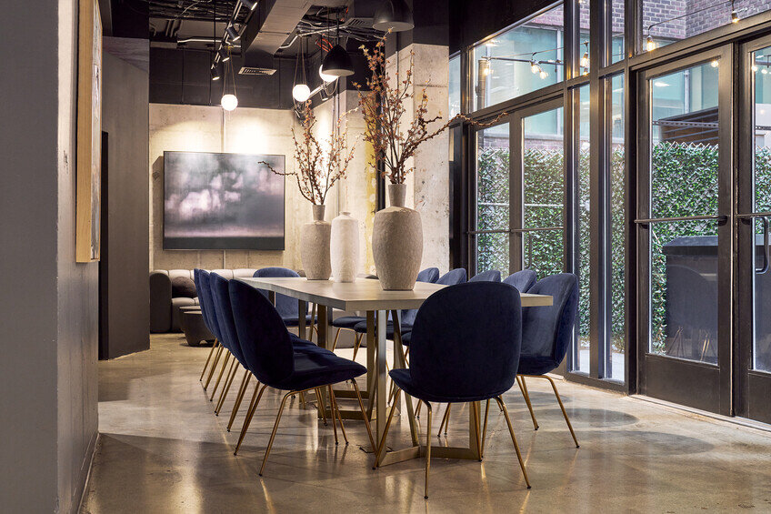 a room with a table and chairs